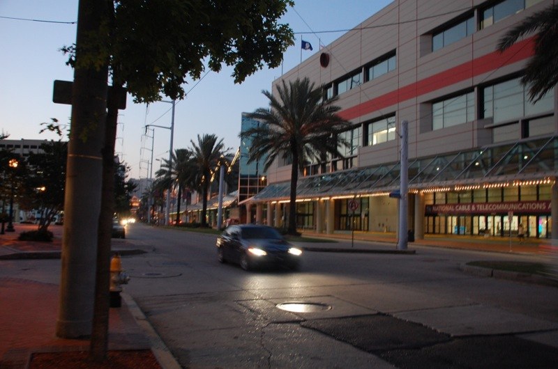 The Morial Convention Center at dusk. AAO 2026 runs Oct. 9-12, with the main program and Expo from Saturday through Monday.