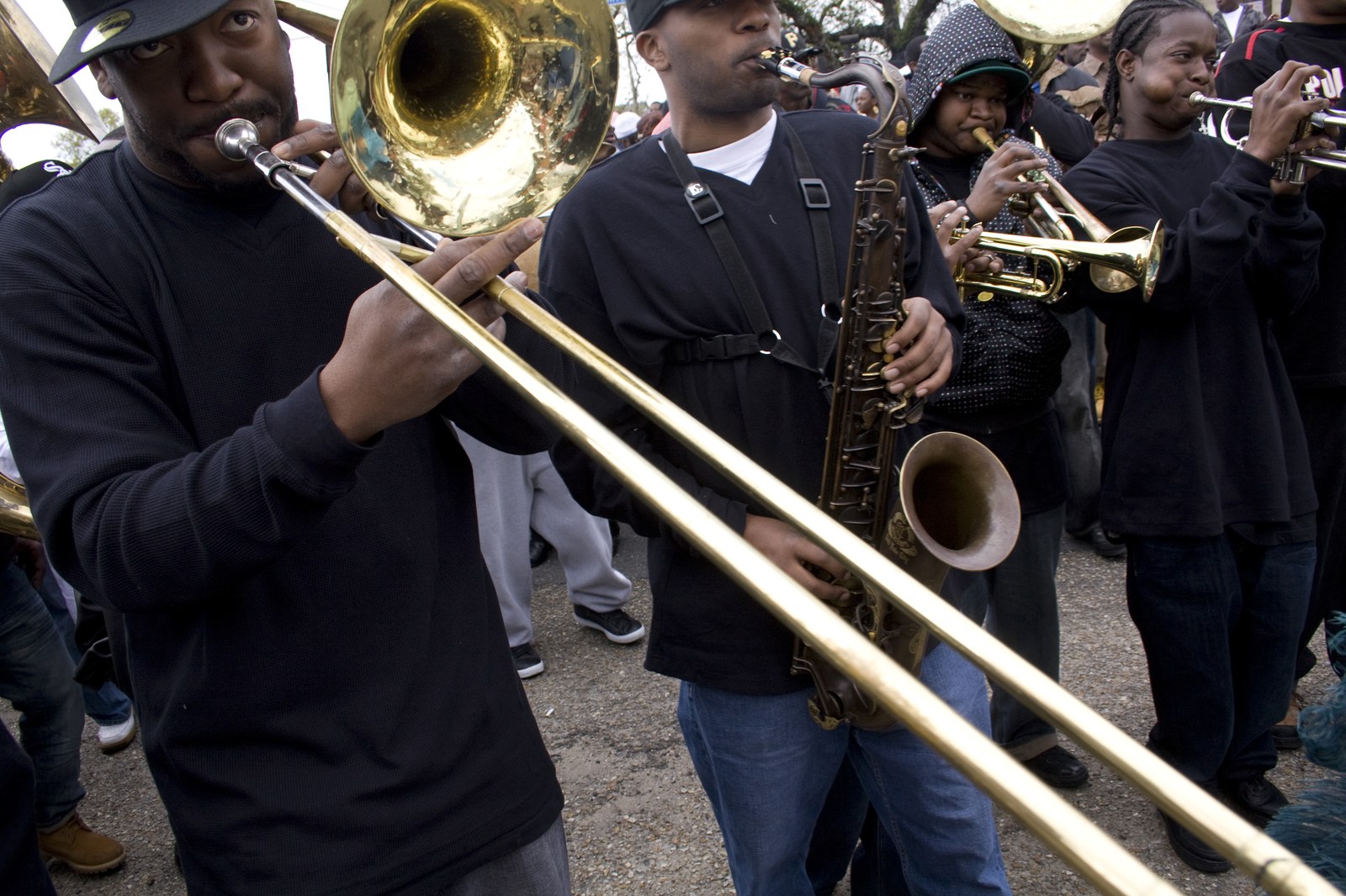The Single Men Social Aid and Pleasure Club parading in 2010. The clubs organize the routes, the suits, and the Sunday calendar.
