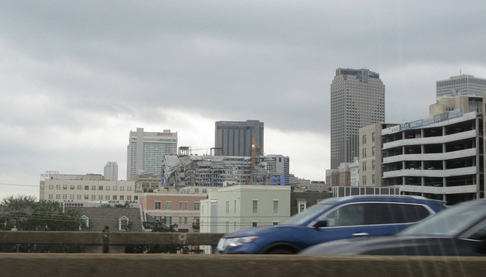 Vehicles move along Interstate 10 in New Orleans. Police said a speeding car made a sudden lane change and flipped on I-10 West on Sept. 25, trapping its driver.