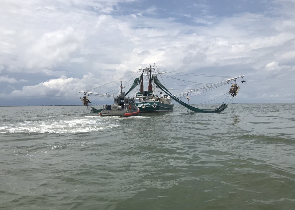 A Coast Guard Station Grand Isle 45-foot Response Boat-Medium alongside the fishing vessel Miss Melissa during a medevac on Aug. 2, 2021. Station Grand Isle crews work the waters south of the Louisiana coast where the Rem Andes rescue took place on Monday. File photograph.