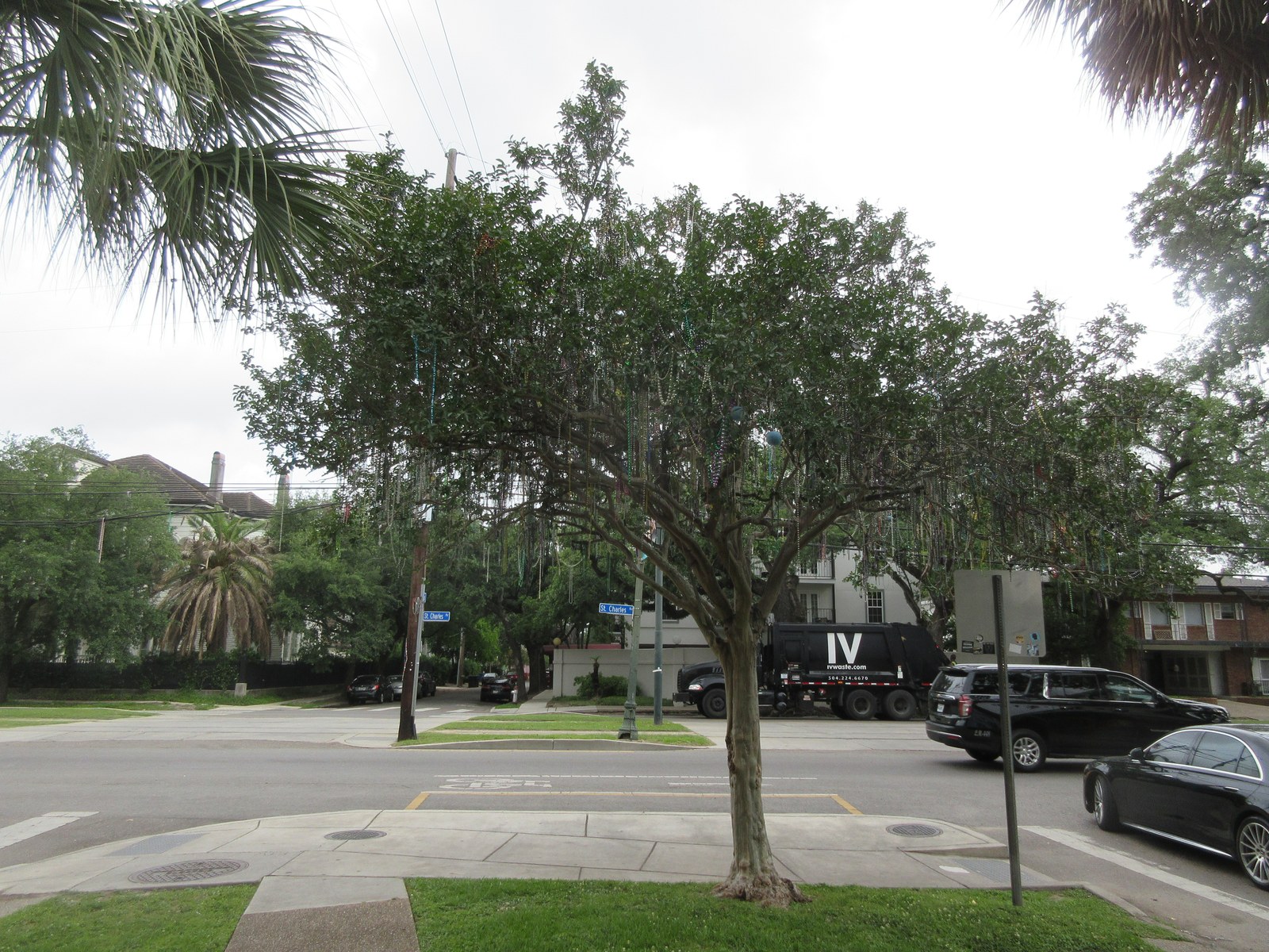 A garbage truck works St. Charles Avenue. The city says the current fee has not kept pace with contract, fuel, and equipment costs.